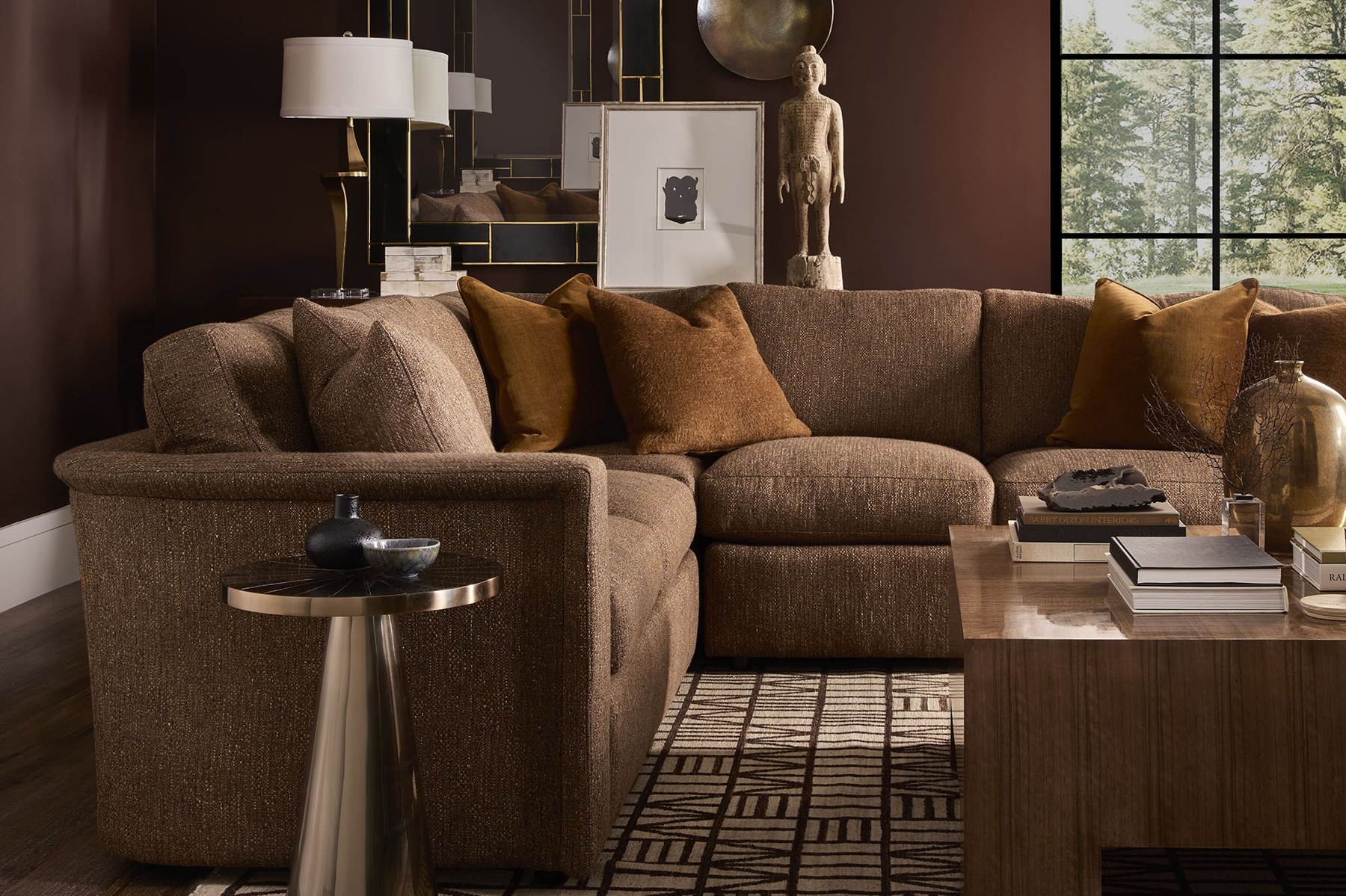 Warm chocolate curved sectional with rust accents, a Fall High Point Market look from Hickory White