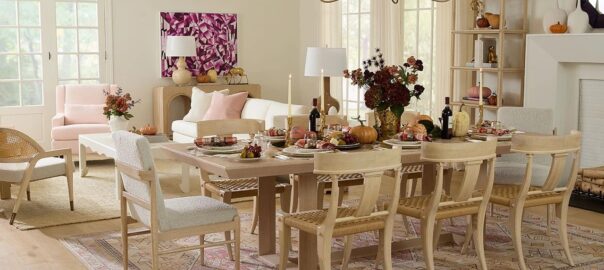 Fall dining room styled for entertaining with a layered table and open shelving