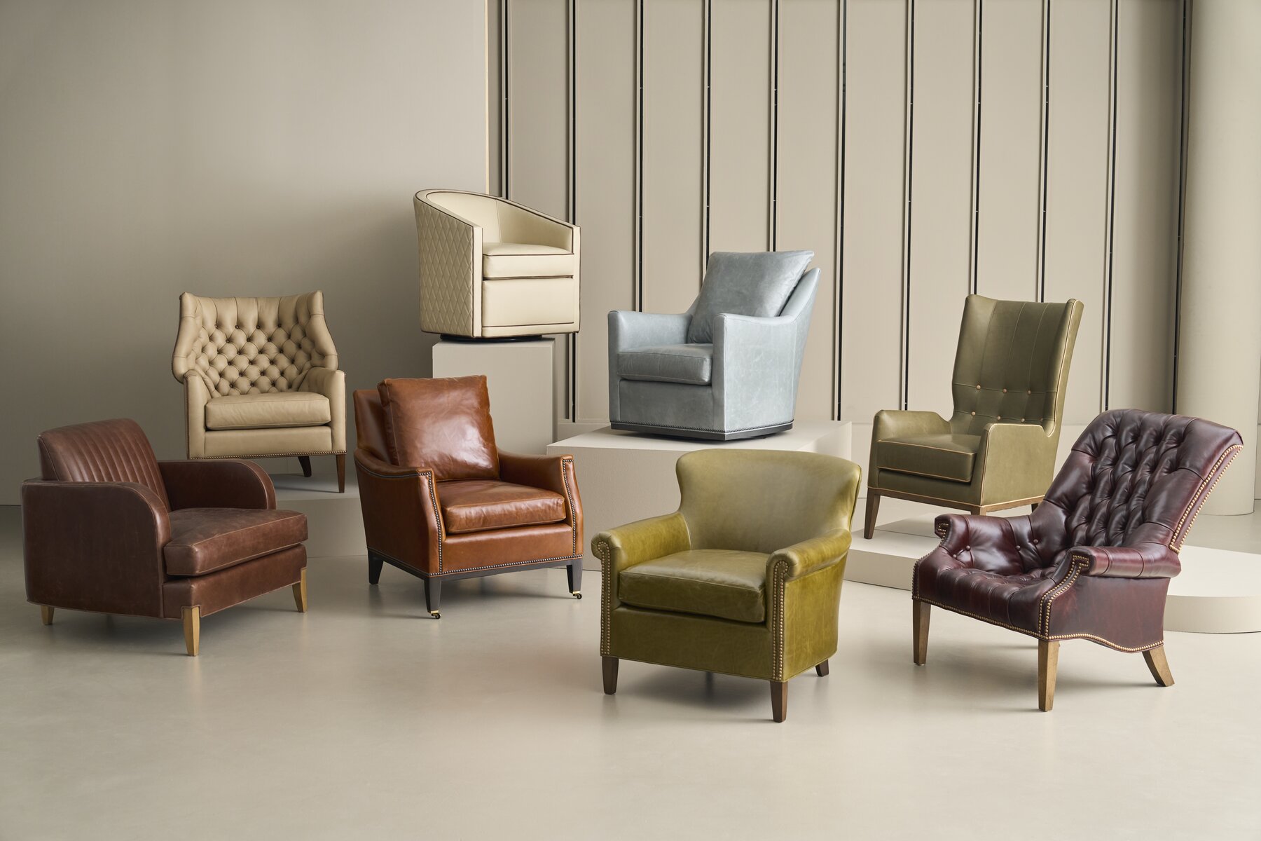 Wesley Hall chairs shown in a range of different leathers and fabrics