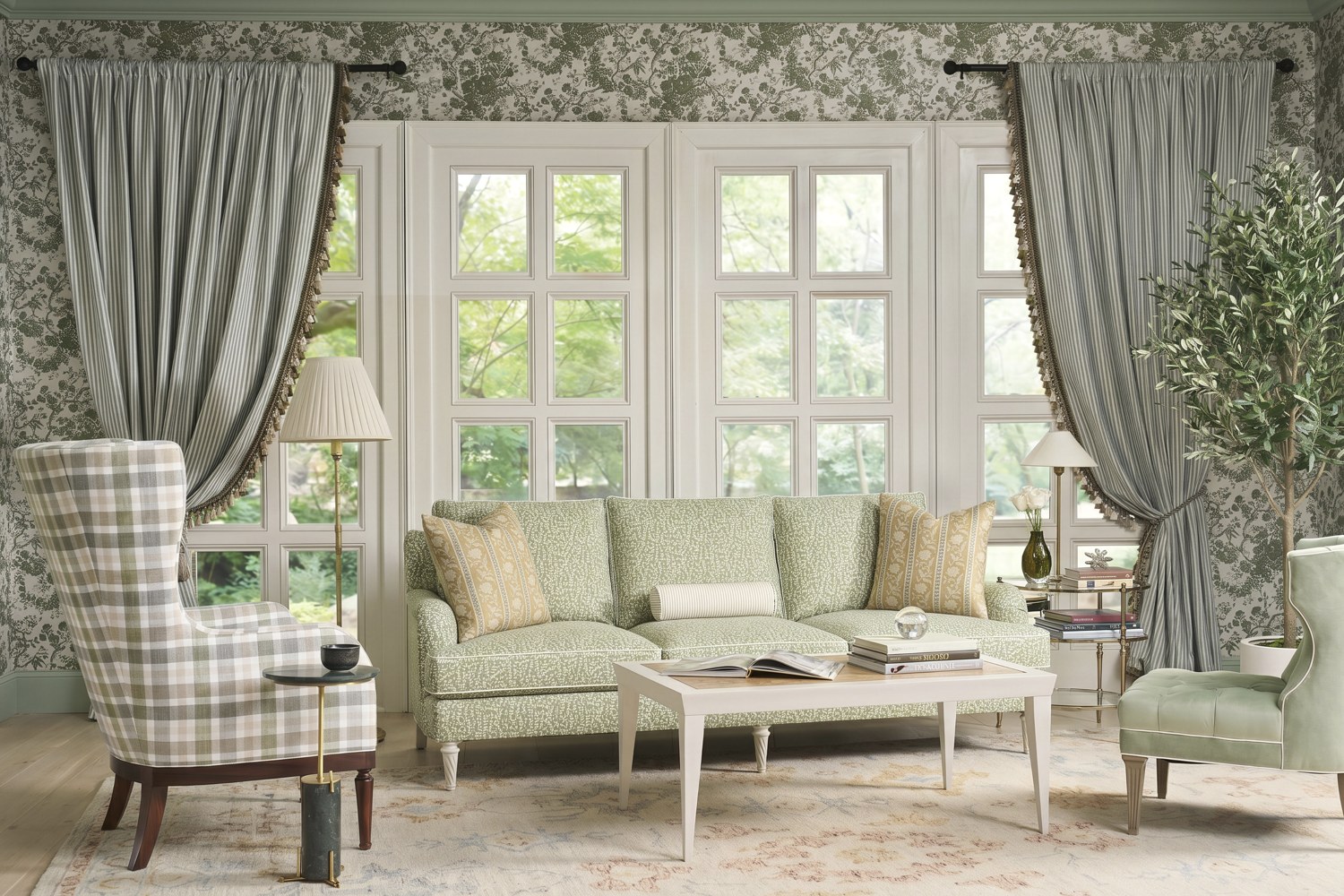 A living room palette of warm woods and soft tones repeated to unify an open plan