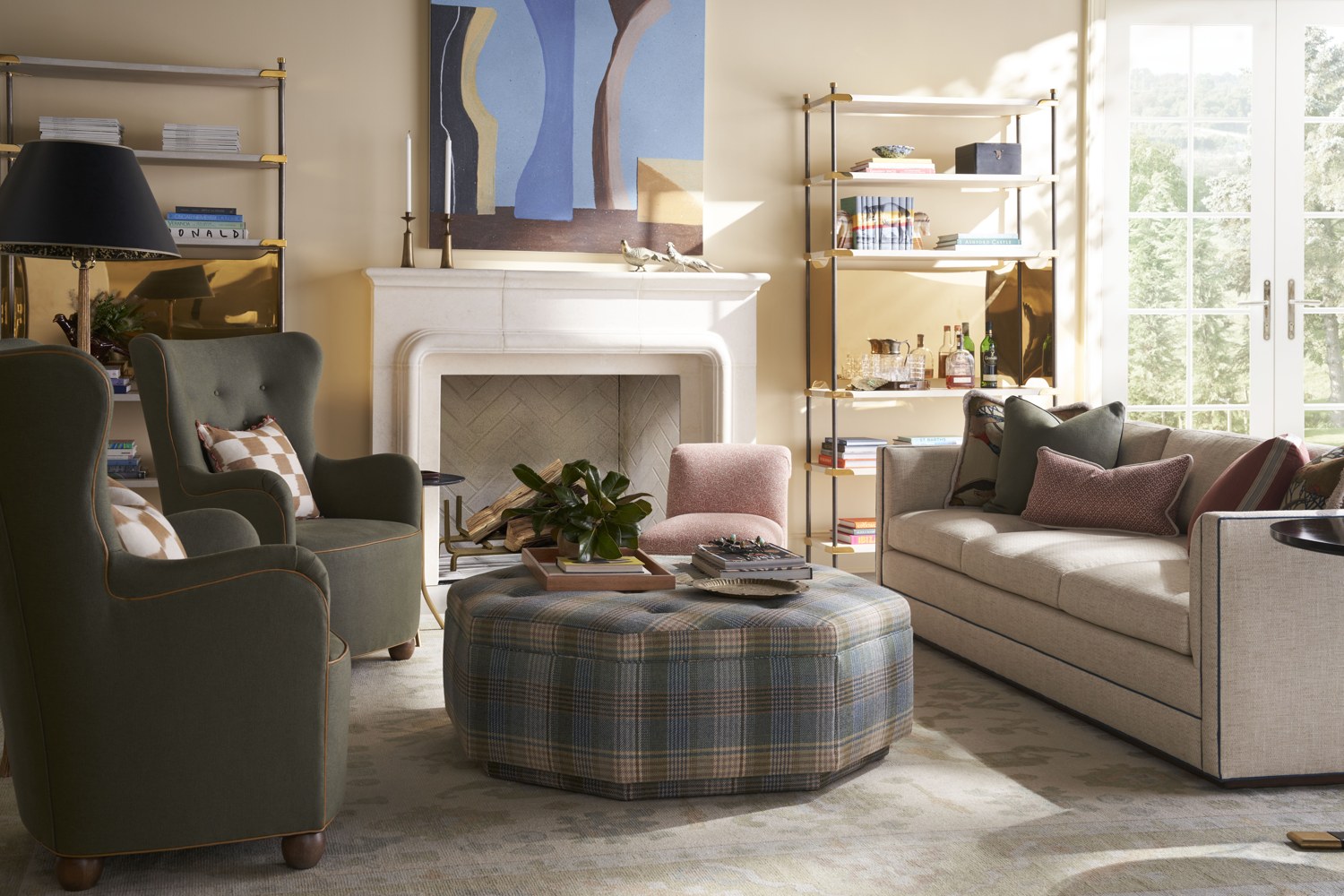 A living room of versatile, hardworking pieces chosen for an open concept home